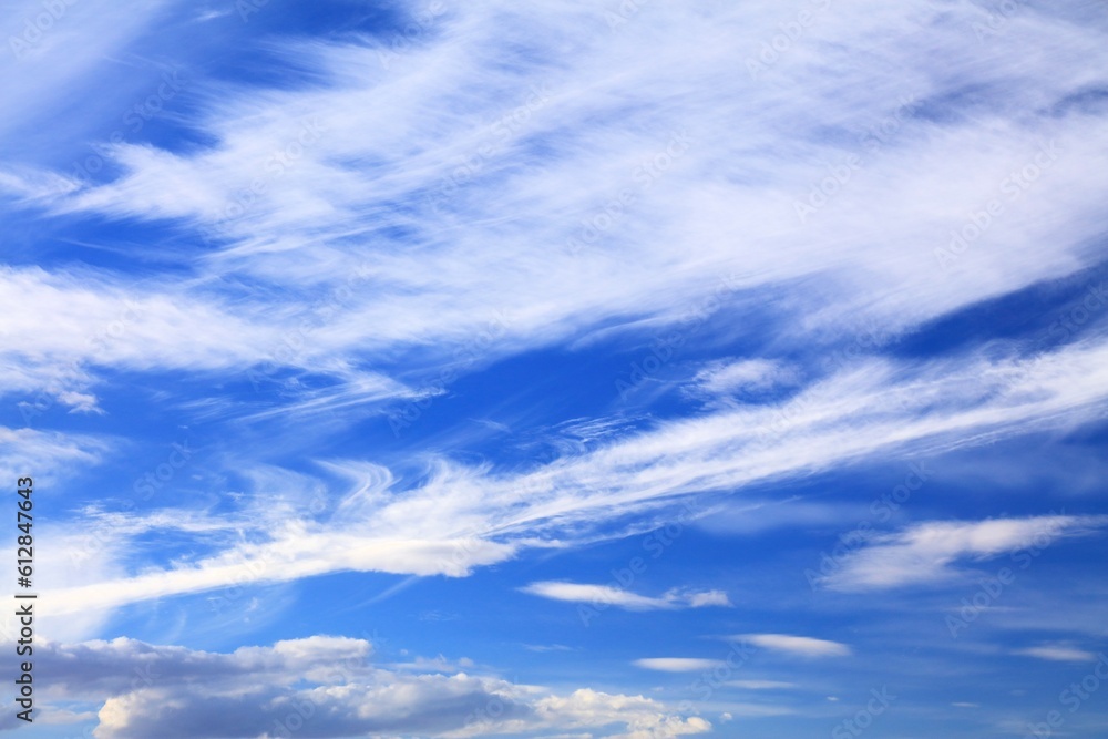 White clouds blue sky background. White fluffly clouds texture. White clouds blue sky background. White fluffly clouds texture.