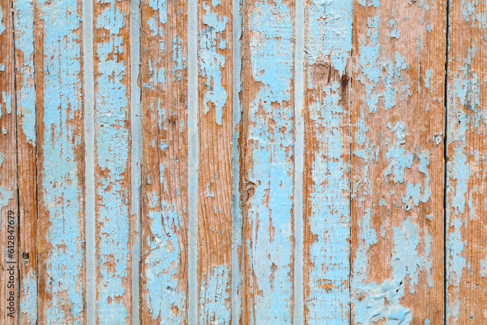 Old wood background. Grunge wooden painted planks texture. Flaking paint.