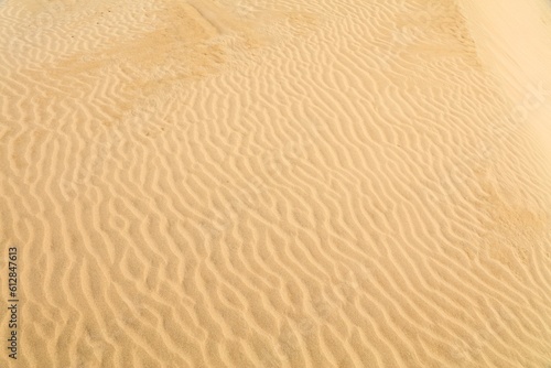 Sand pattern texture in Morocco. Desert Sahara sand ripples background.