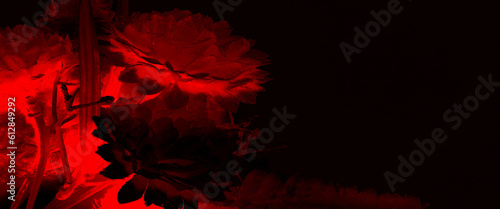 Beautiful tropical flowers with leaves on red color background, tropical palm leaf on red background. Flat lay, top view, creative red background with tropical palm leaves.