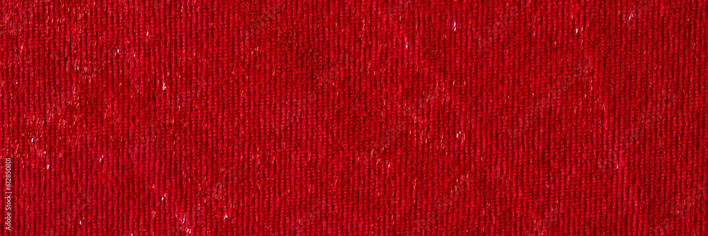 Dark red smooth textile material with shiny thread textured background Dark red smooth textile material with shiny thread textured background
