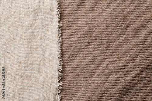 Linen in different textures and colors. Natural fabrics from organic flax and cotton, homespun textile handmade. Burlap and canvas for eco, rustic, boho, hygge decor closeup background