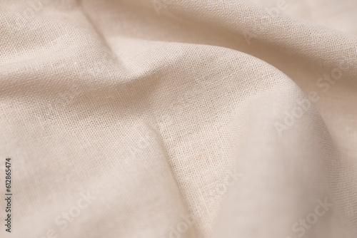 Natural linen fabric texture. Rough crumpled burlap background. Selective focus