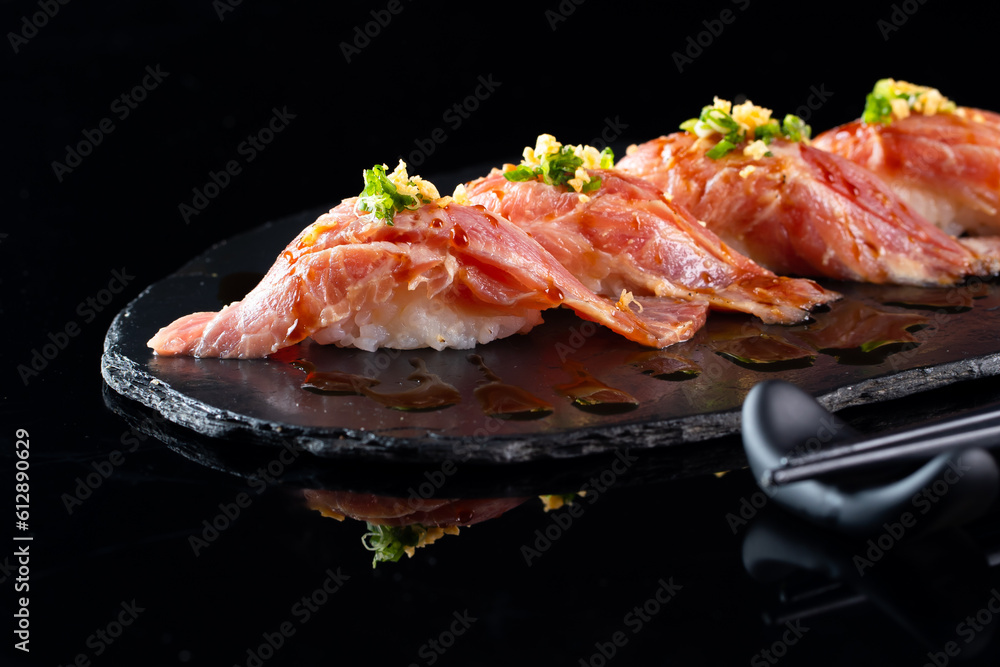 Sushi of Japanese, Salmon Roll Sushi. Collection of sushi on dark background, sushi is a Japanese favorite, Japanese food