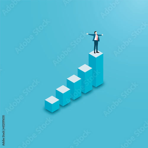Happy businessman on stock diagram graph