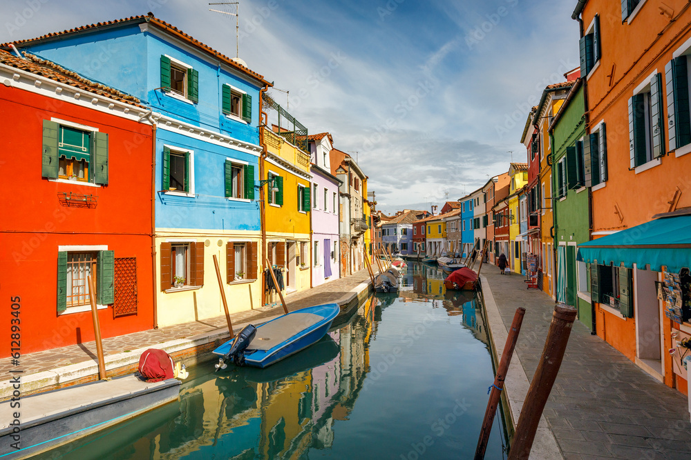 The Burano island near Venice, a canal between colorful houses, Italy, Europe.