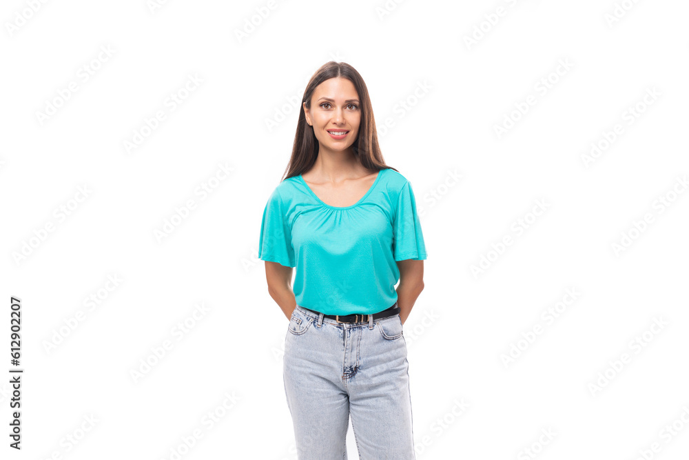 Obraz premium young pretty european woman with black long hair dressed in a blue t-shirt