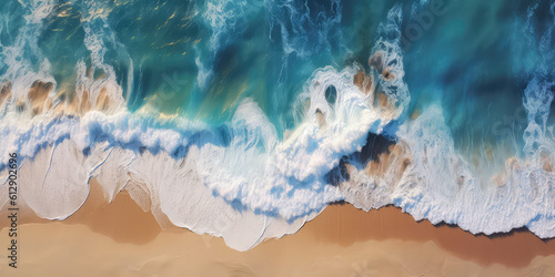 Top view on blue ocean waves with white foam crashing on the clear sandy beach shore. Beach summer vacation on seashore, horizontal banner. Generative AI drone overhead photo imitation.