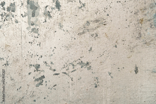 Detail of old scraped galvanized steel metal sheet with worn out white coating, grunge texture