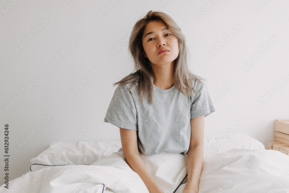 Funny face sleepy head asian woman just wake up in the morning dizzy and lazy. Funny face sleepy head asian woman just wake up in the morning dizzy and lazy.