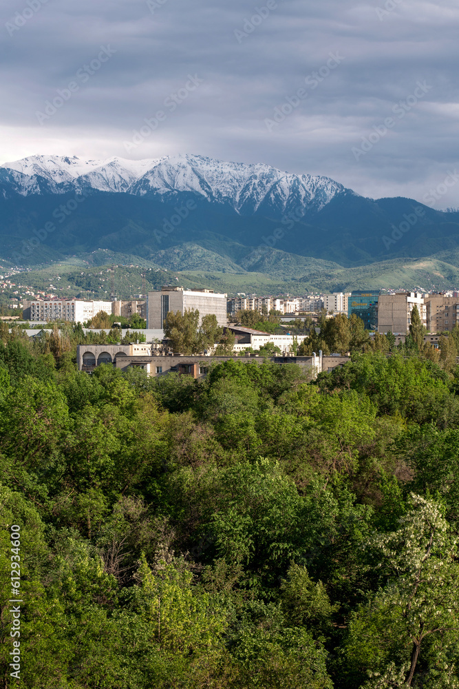 modern green Kazakh city of Almaty with beautiful mountains