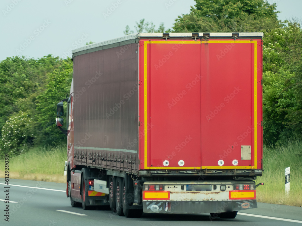 Trucks on the European highway. Transportation of goods.