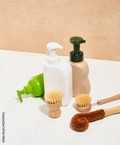 Eco friendly dish brushes with natural bristles. Dispensers with detergent for dishes.