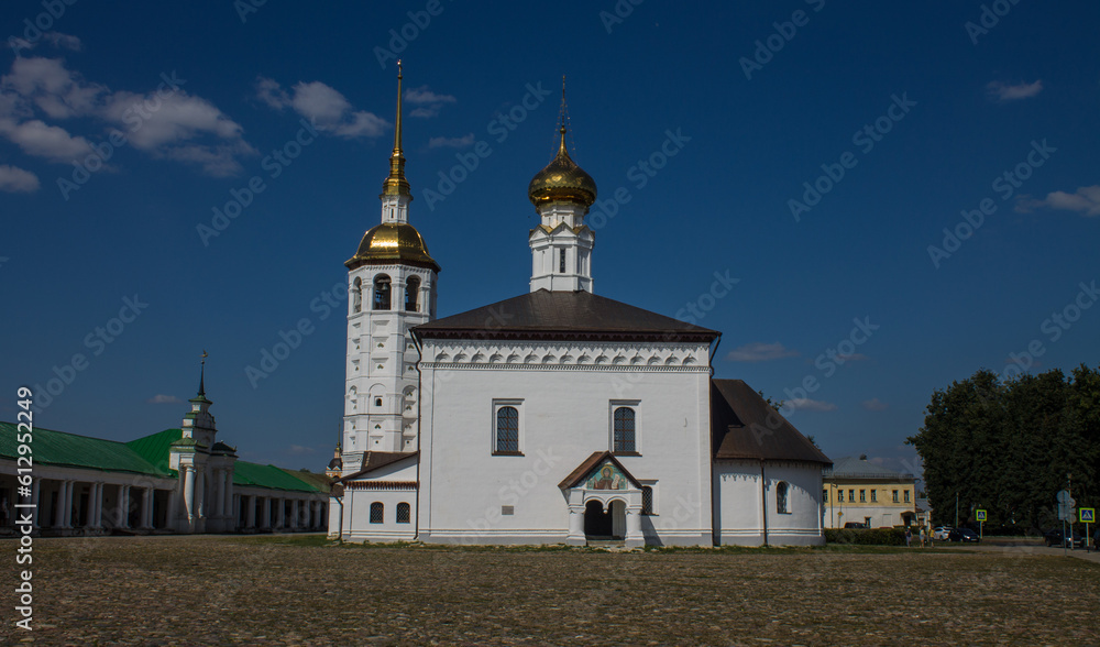 Suzdal, Vladimir Region, Russia - August, 18, 2022: white-stone Resurrection Church on the main square of the city on a sunny summer day against the blue sky Suzdal, Vladimir Region, Russia - August, 18, 2022: white-stone Resurrection Church on the main square of the city on a sunny summer day against the blue sky