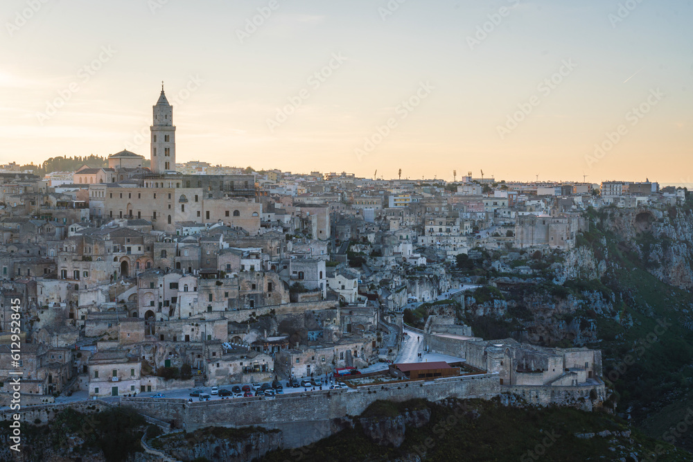 Matera city skyline, the ancient town of Matera at sunrise or sunset, Matera, Italy Matera city skyline, the ancient town of Matera at sunrise or sunset, Matera, Italy