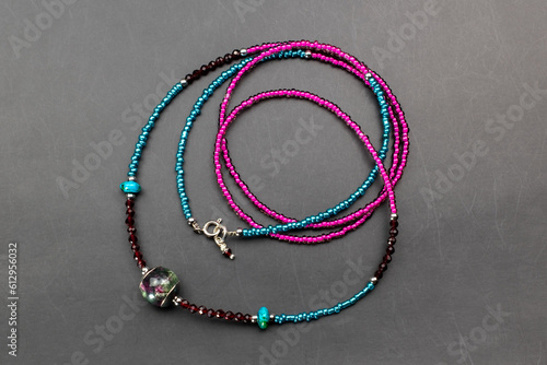 Unique colorful gemstone necklace, handmade jewelry concept, promotional photo for an online jewelry store