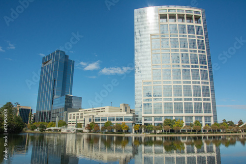 The view in Woodlands Town Center located in Montgomery County, Texas, USA with modern glass buildings and waterway