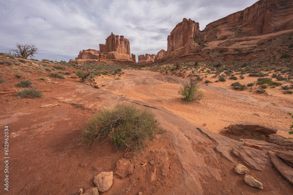 hiking the park avenue trail in arches national park, utah, usa hiking the park avenue trail in arches national park, utah, usa