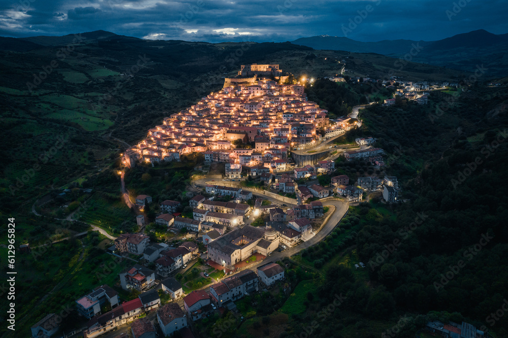 Aerial view of Italian hilltop town, Rocca Imperiale at dusk in the Calabria Region