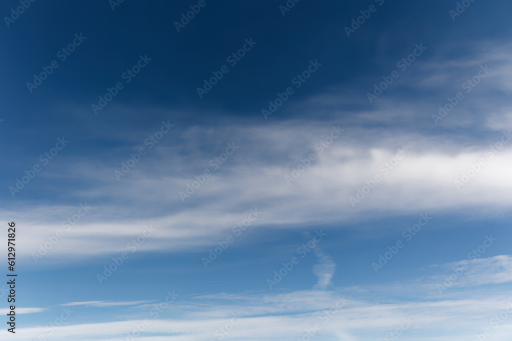 A bright blue sky with wise white clouds for an open background for inspirational slogans A bright blue sky with wise white clouds for an open background for inspirational slogans