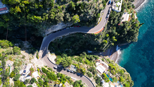 Winding road aerial drone view in Amalfi Coast Positano Italy