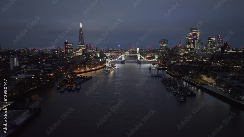 Aerial night view of the Tower Bridge in London. Beautiful illuminated panorama of London Tower Bridge. Aerial night view of the Tower Bridge in London. Beautiful illuminated panorama of London Tower Bridge.