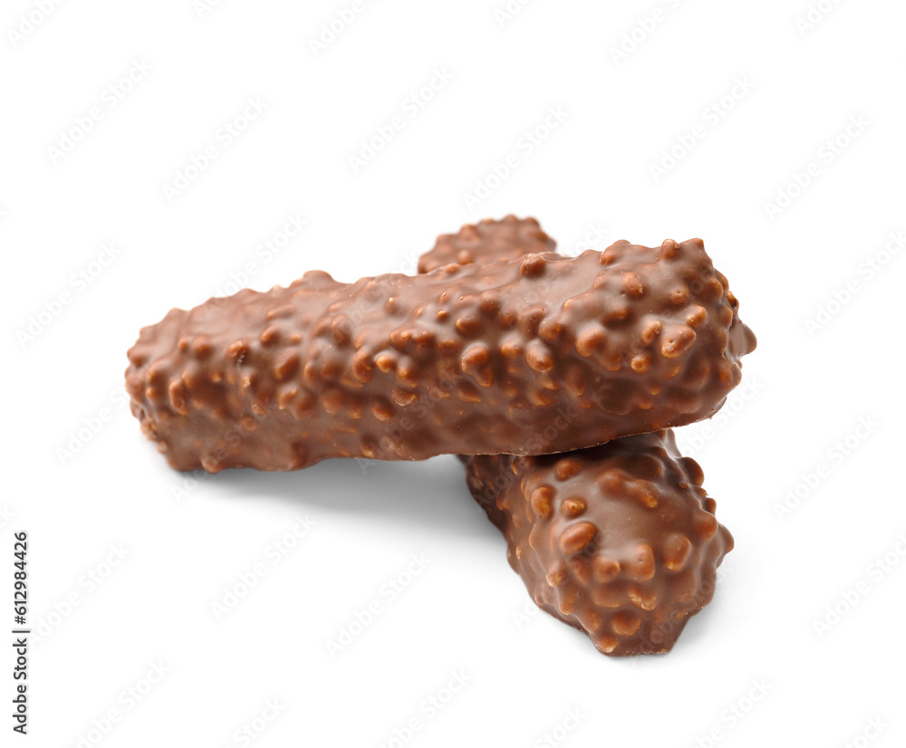 Crispy chocolate bars with waffles and caramel isolated on white background. Crispy chocolate bars with waffles and caramel isolated on white background.