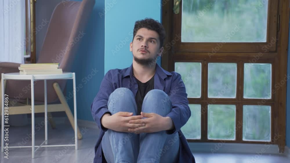Paranoid guy pretending someone's coming. Paranoid guy pretending someone's coming.