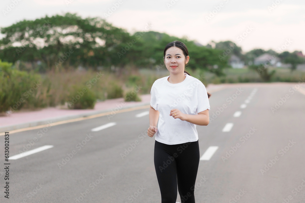 Asian young women running outdoors, healthy lifestyle, and sports concepts