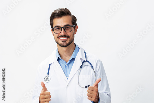 Man doctor in white coat listening to lungs and heart with stethoscope with teeth smile on white isolated background  copy space  space for text  health