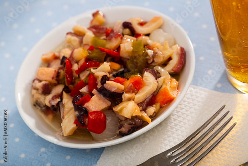 Colorful delicious seafood Salpicon, popular Spanish light appetizer from vegetables and seafood mix