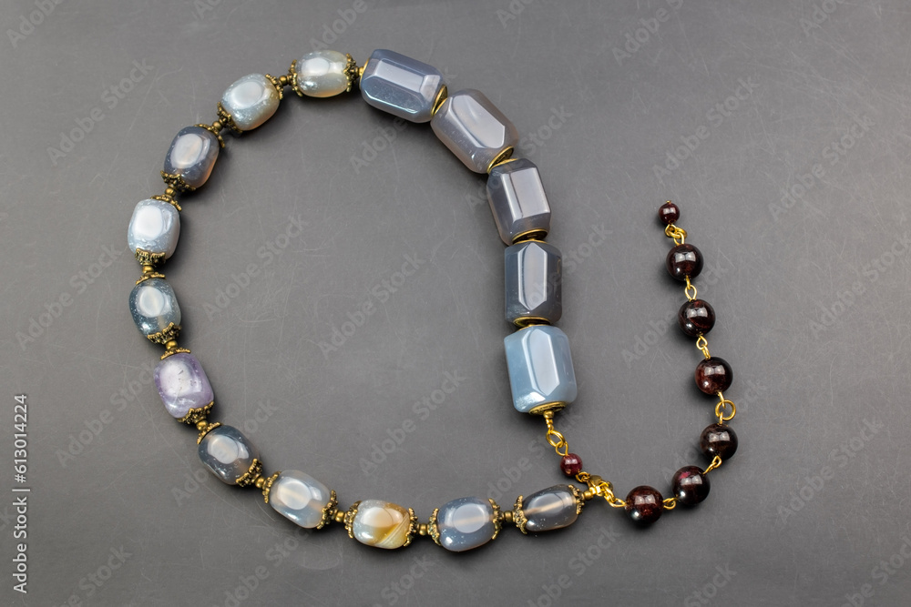 Statement stone bead necklace, massive unusual handmade jewelry, promotional photo for an online jewellery store Statement stone bead necklace, massive unusual handmade jewelry, promotional photo for an online jewellery store