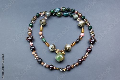 Unique colorful gemstone necklace, handmade jewelry concept, promotional photo for an online jewelry store