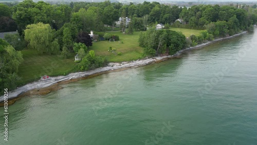 Aerial Drone View of Lake Ontario's Rocky Coast during Sunset hours (Cobourg, Ontario, Canada) photo