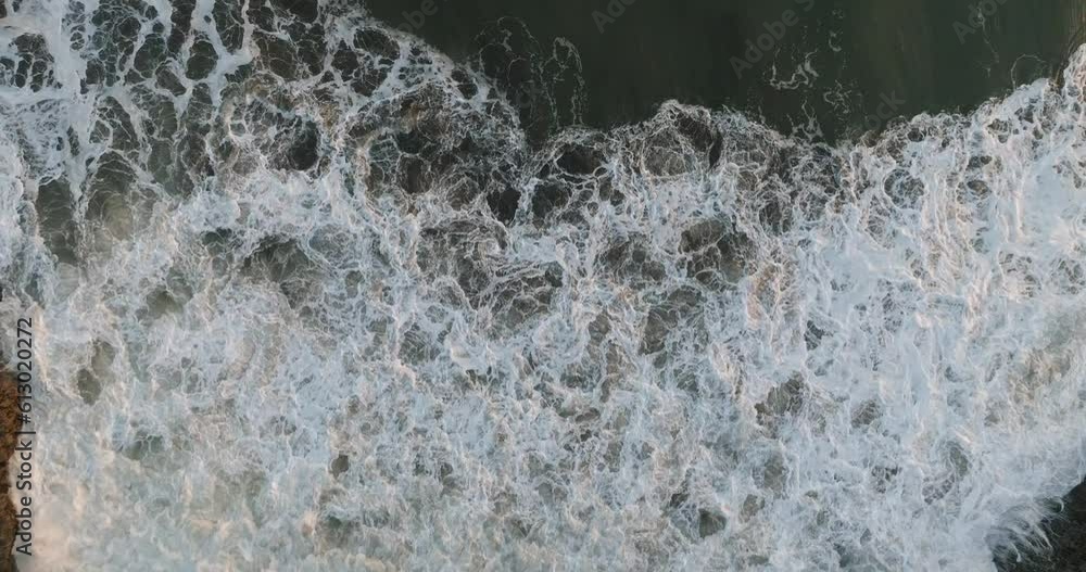 Texture of water surface of sea reflection of sun's rays. View from drone Texture of water surface of sea reflection of sun's rays. View from drone