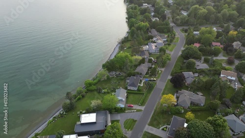 Aerial Drone View of Lake Ontario's Rocky Coast during Sunset hours (Cobourg, Ontario, Canada) photo