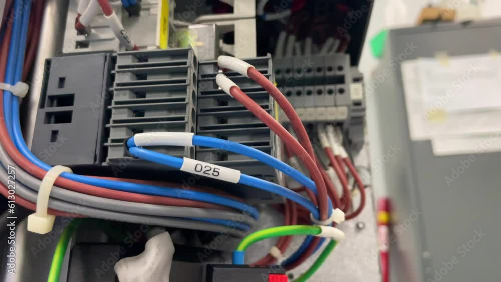 Close up of Wires and electrical circuits in control boxes for industrial machinery Close up of Wires and electrical circuits in control boxes for industrial machinery