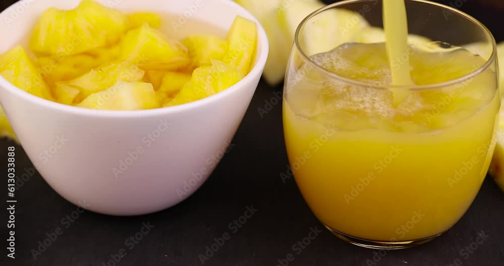 pineapple juice poured into a glass glass, cooking food and drinks from pineapples pineapple juice poured into a glass glass, cooking food and drinks from pineapples
