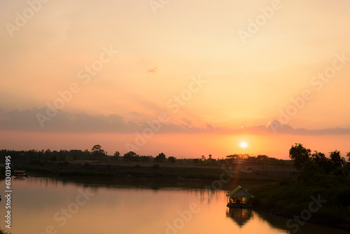 Sunset day with beautiful orange sky twilight weather. © Subhakitnibhat