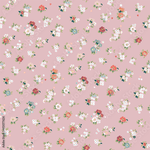 Fashionable pattern with small flowers on a pink background. Seamless botanical print with various floral elements. Collection of vintage textiles.