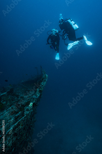 Wallpaper Mural divers exploring shipwreck in the Maldives Torontodigital.ca