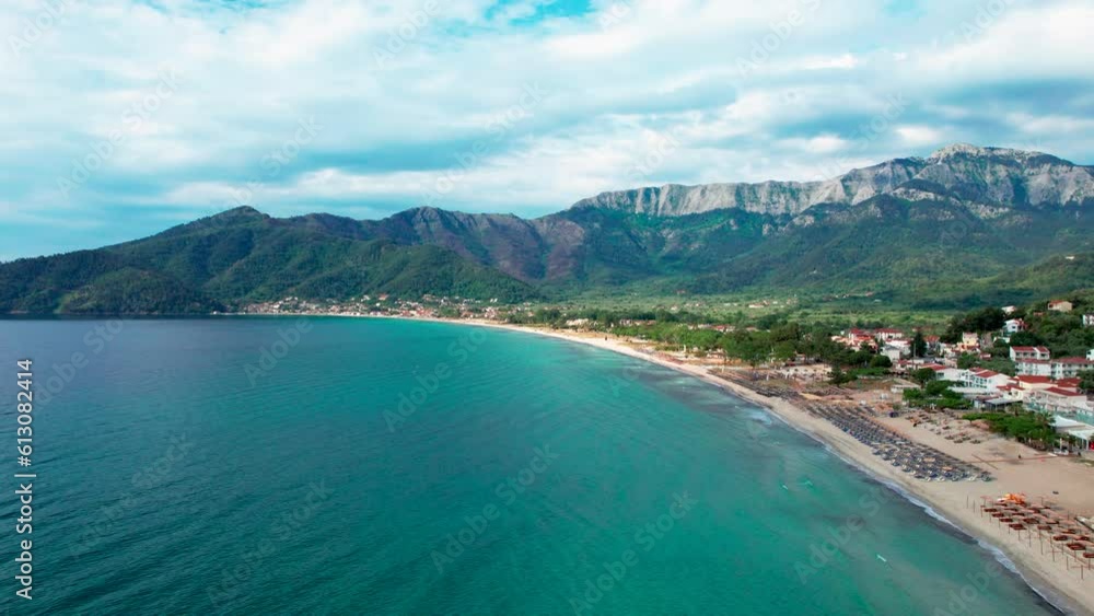 Top Down View Of Golden Beach With Towering Mountain Peaks, Beautiful Beachfront And Lush Vegetation, Thassos Island, Greece, Europe Top Down View Of Golden Beach With Towering Mountain Peaks, Beautiful Beachfront And Lush Vegetation, Thassos Island, Greece, Europe