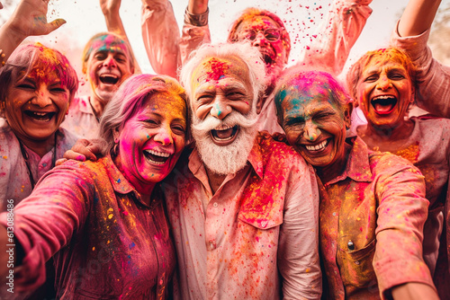 Group of senior friends celebrating a Holi party
