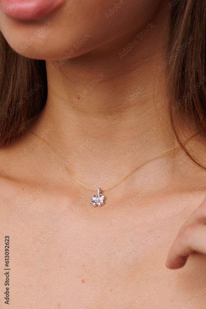 Beautiful young girl with fresh healthy skin. Woman advertise ear-rings. White background. Earrings closeup. Blond european woman with long hair with big lips, pretty smile. Cosmetology, scincare Beautiful young girl with fresh healthy skin. Woman advertise ear-rings. White background. Earrings closeup. Blond european woman with long hair with big lips, pretty smile. Cosmetology, scincare