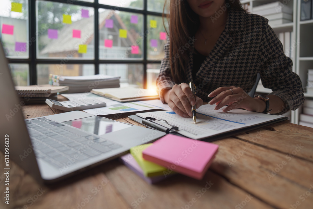 Accountant woman working on laptop and do document, tax, exchange, research, accounting and Financial advisor concept Accountant woman working on laptop and do document, tax, exchange, research, accounting and Financial advisor concept