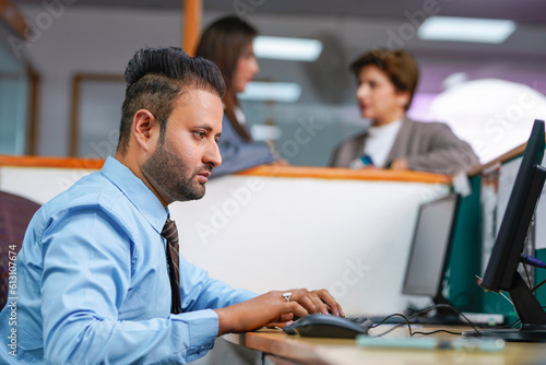 Indian corporate employee working at office