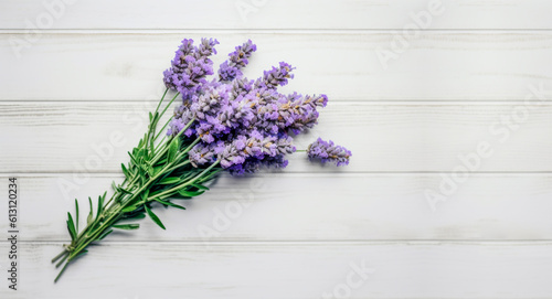 Beautiful bouquet of fresh lavender flowers with copy space for your text. Top view of lavender flowers on white wooden background. Generative AI