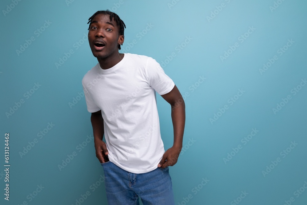 african young man with dreadlocks dressed in a white t-shirt for thermal printing african young man with dreadlocks dressed in a white t-shirt for thermal printing