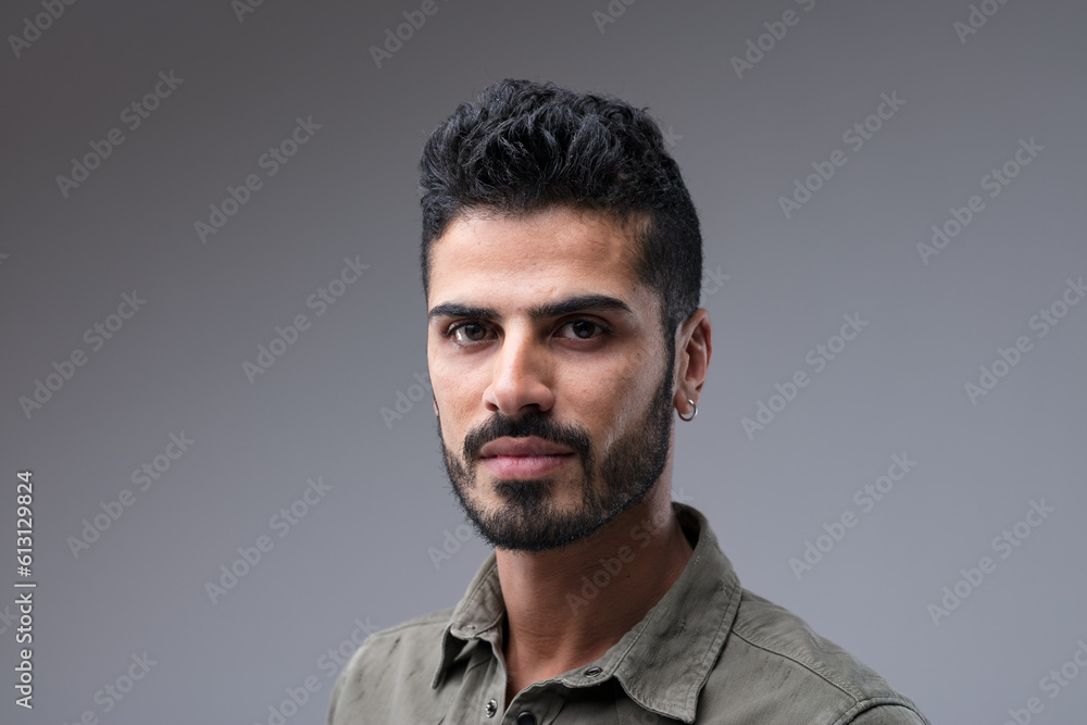 Smiling Middle Eastern man with groomed beard Smiling Middle Eastern man with groomed beard