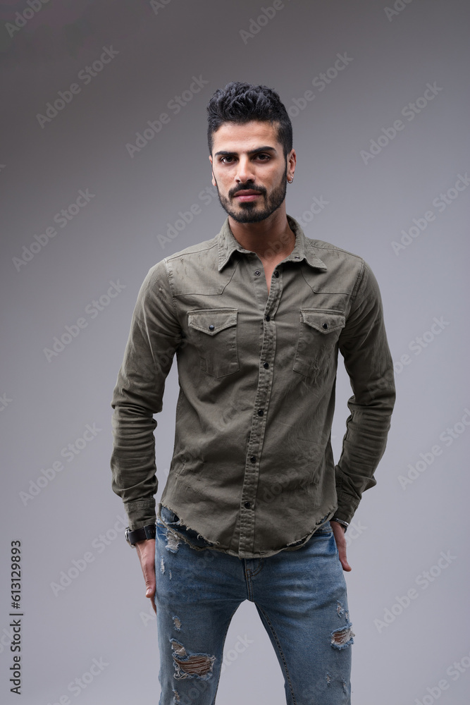 Attractive man in medium shot, awaiting seriously